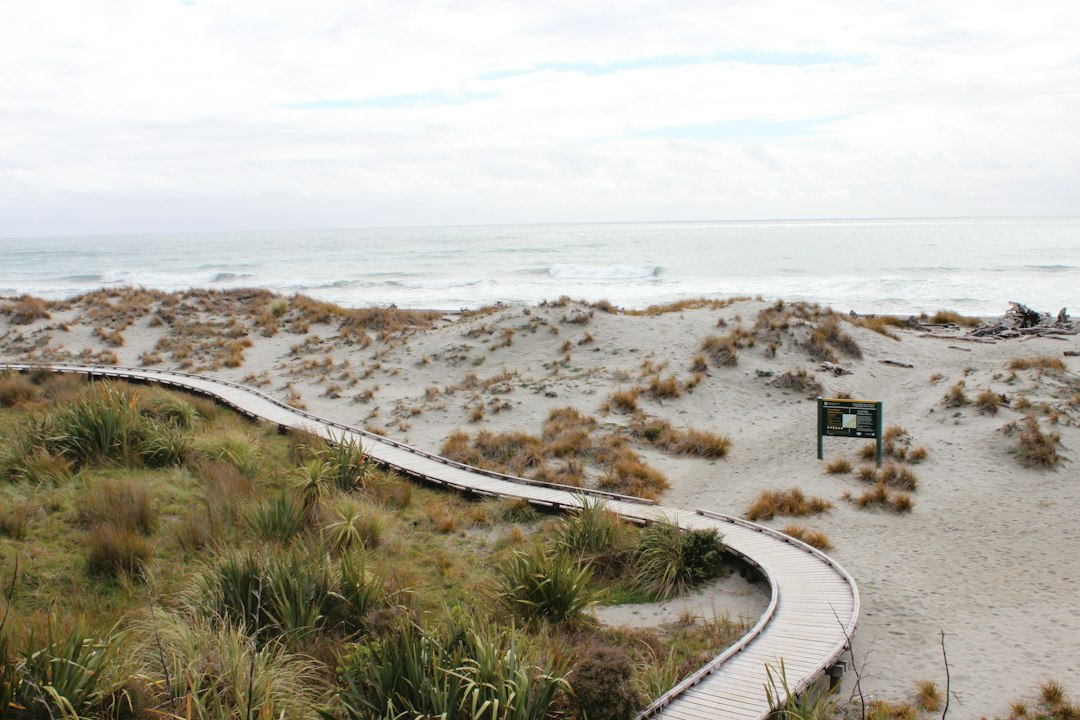 Representative coastal beach scene; not the actual property